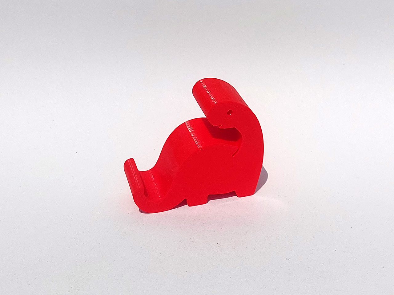 Dinozauras telefono laikiklis 12006-2