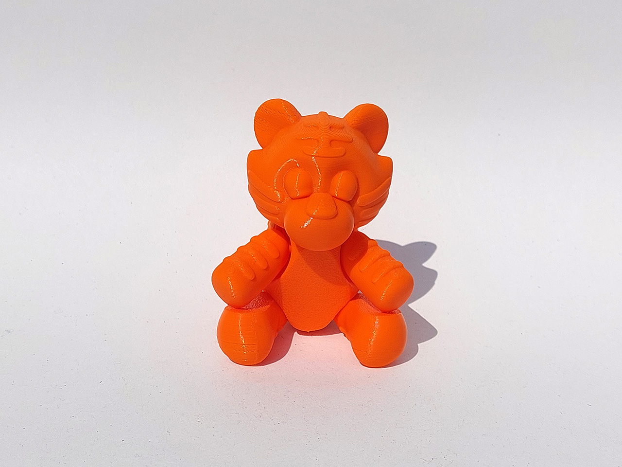 Tigriukas lankstus telefono laikiklis 12013-1